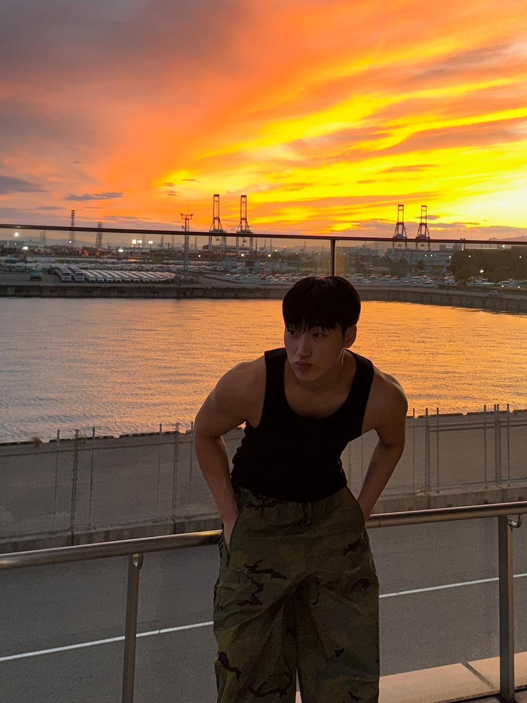 Photo by 산 (SAN) on October 05, 2025. May be an image of 1 person, military uniform, cloud, twilight and text.