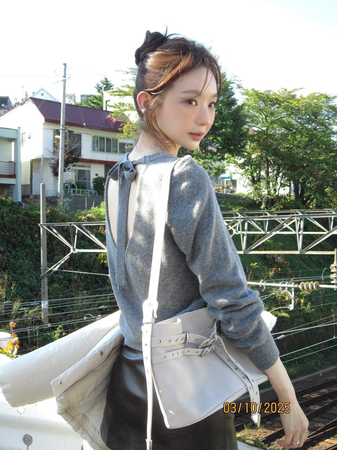 Photo shared by 강민경 (행동파) on November 24, 2025 tagging @aviemuah. May be an image of purse and text.