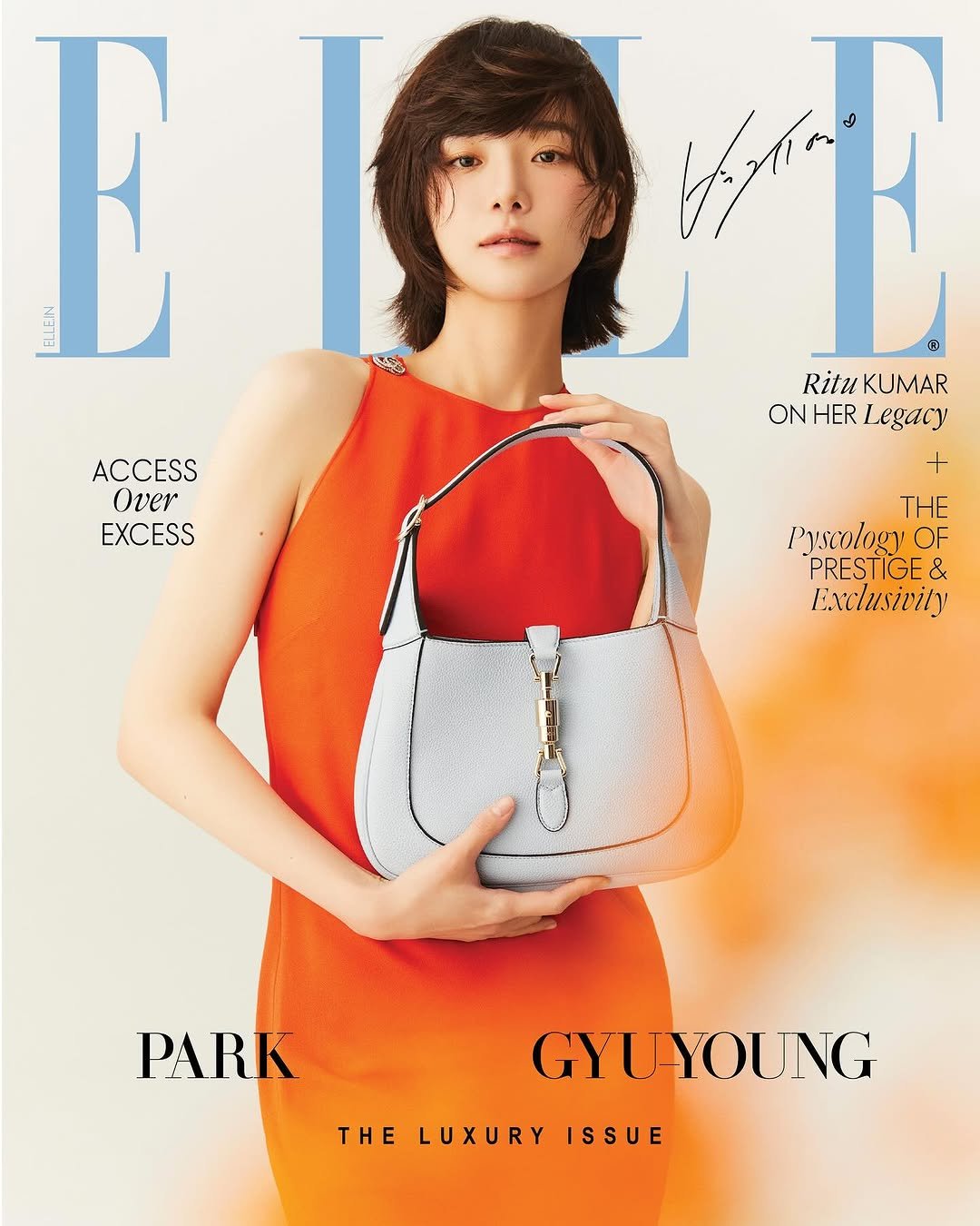 Photo shared by ELLE India on July 04, 2025 tagging @gucci, and @lavieenbluu. May be an image of 1 person, pouch, clutch, magazine, purse and text that says 'E ELOI KF ® И SKD Ritu KUMAR ONHERLegacy ONHER ON HER Legacy ACCESS + Over THE EXCESS Pyscology OF PRESTIGE& & Exclusivily PARK GYUYOUNG THE THELUXURYISSUE ELUXURYIS LUXURY ISSUE'.
