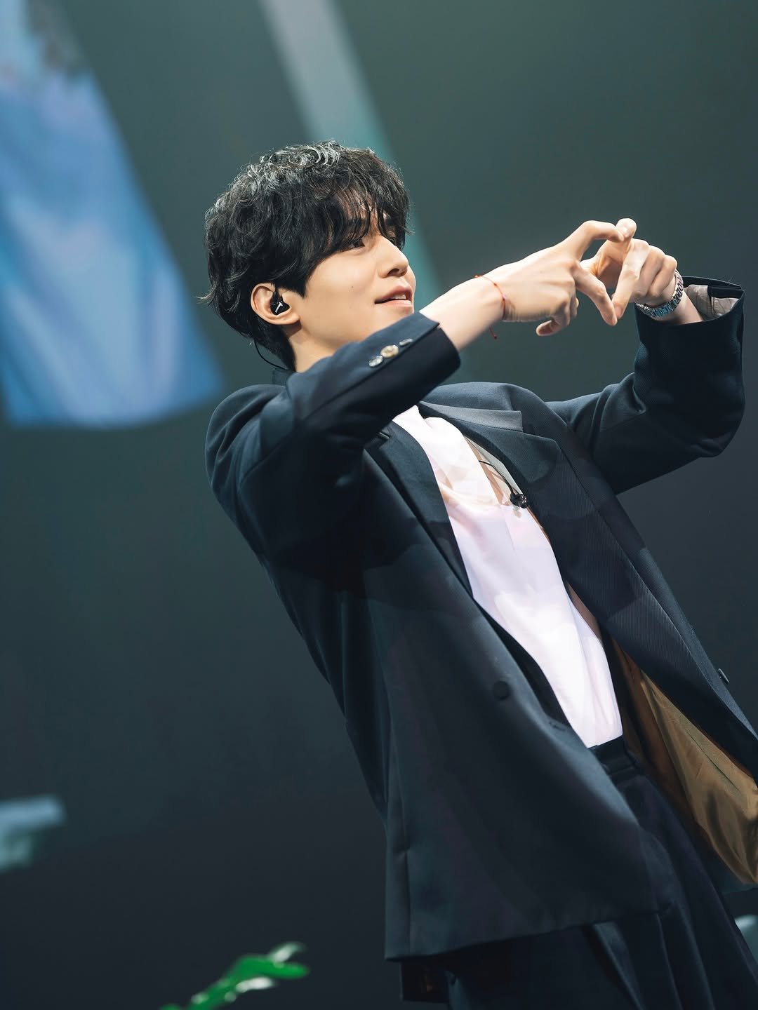 Photo by 이동욱 (Official_Instagram) on December 20, 2025. May be an image of concert and text.