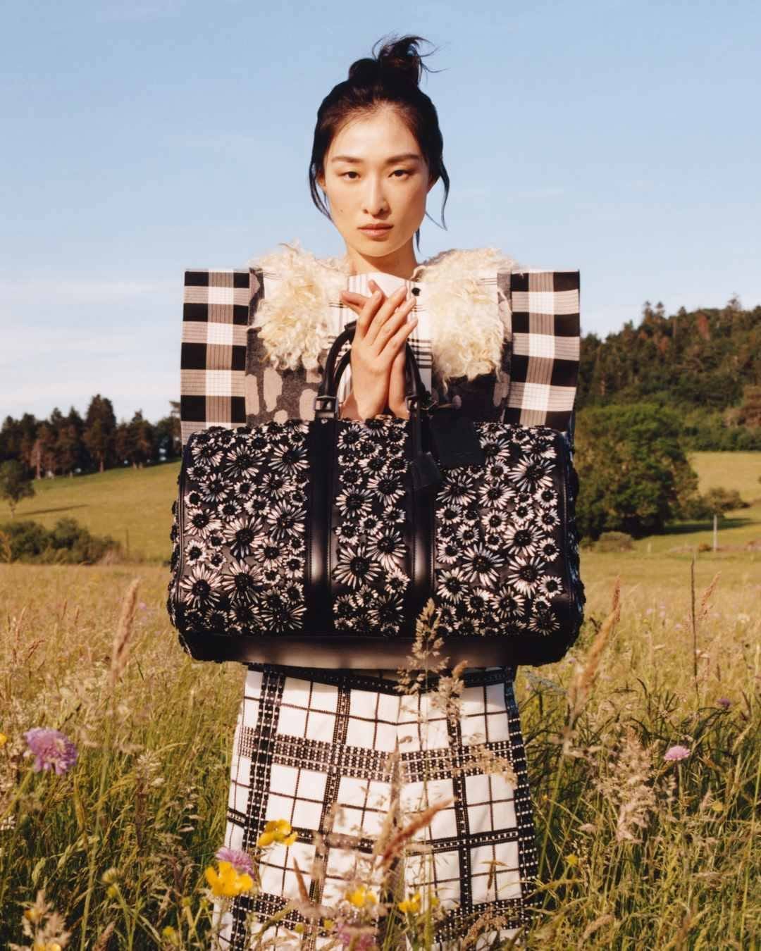 louisvuitton 게시물 이미지: Fall-Winter 2026. Suspended against a pastoral...