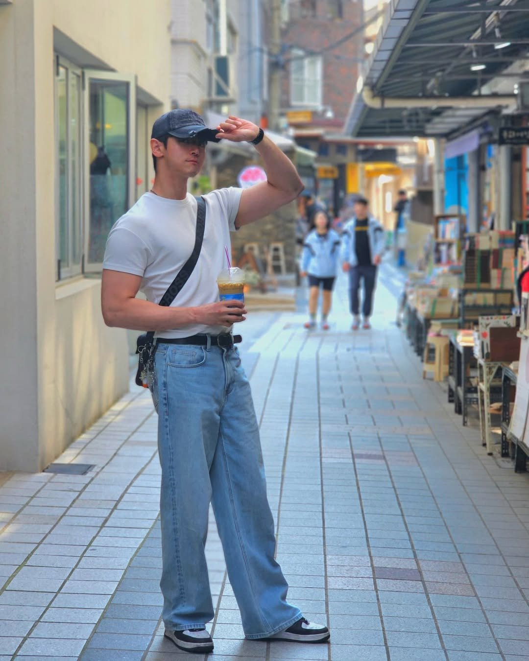Photo by 𝗝𝗮𝗲𝗦𝘂𝗻𝗴_𝗛𝘆𝘂𝗻 on May 14, 2025. May be an image of 3 people, street and text.