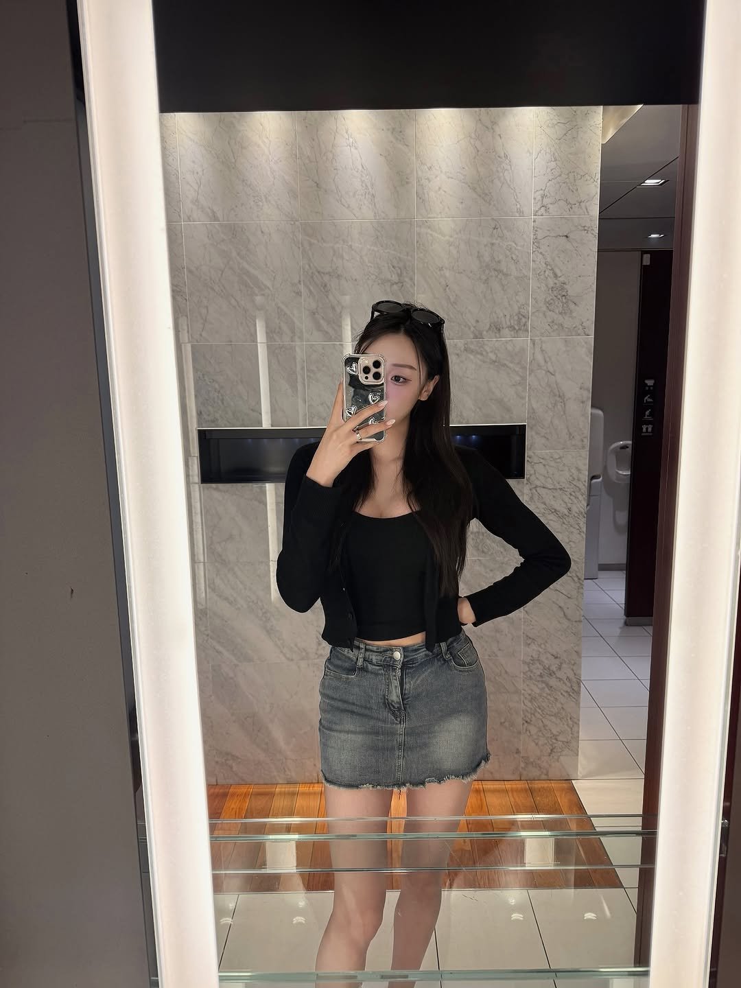 Photo by 장진원 JINWON on June 08, 2025. May be a selfie of mirror, shorts, skirt, top, miniskirt and text.