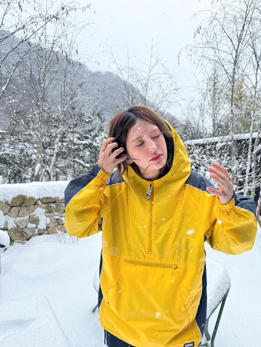 Photo by SOMI on February 21, 2026. May be an image of jacket, snowsuit, raincoat, parka, snow and text.