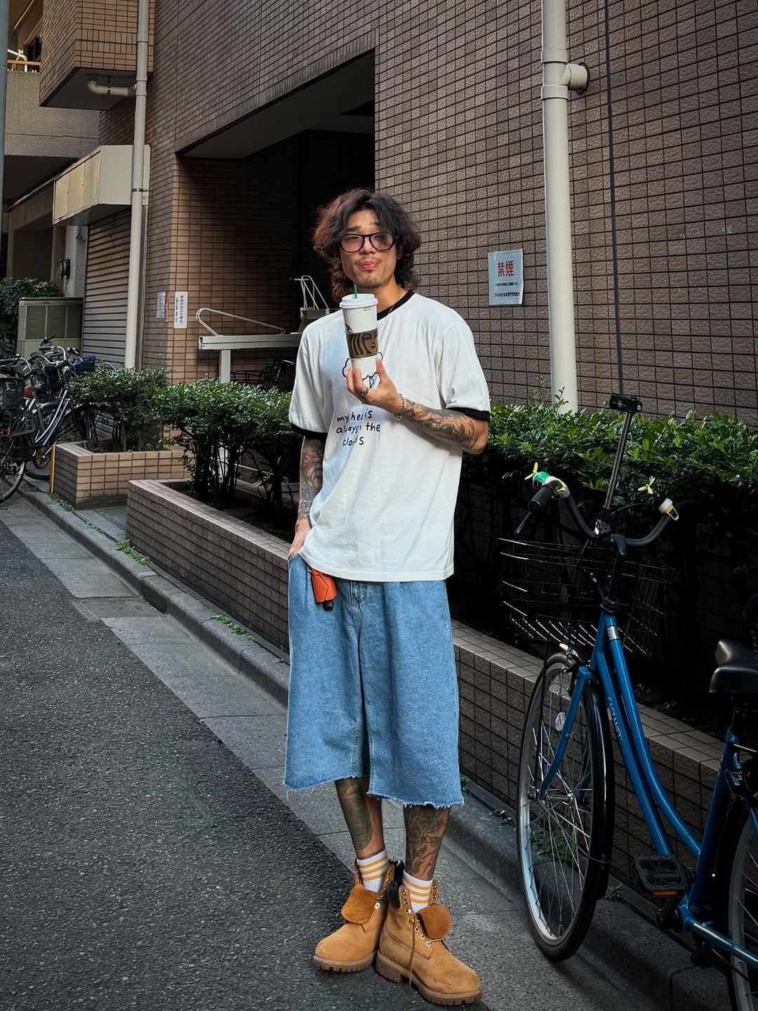 Photo shared by 비 르 on July 26, 2025 tagging @virstyle.kr. May be an image of 1 person, sweatpants, street and text.