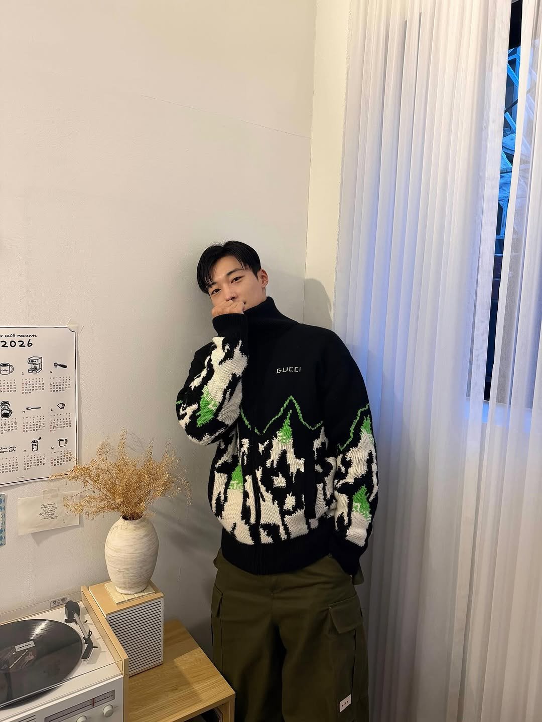 Photo by 우도환 on February 08, 2026. May be an image of duffle coat, sweatpants, sweater, parka, turtleneck, sweatshirt and text.